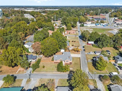 an aerial view of residential building and lake