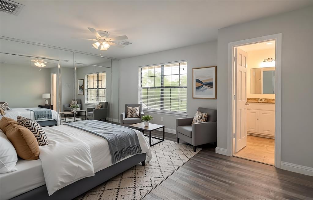 13 Crestview Circle Rockwall, TX 75087 - Photo 32 of 37 a bedroom with a bed and a couch