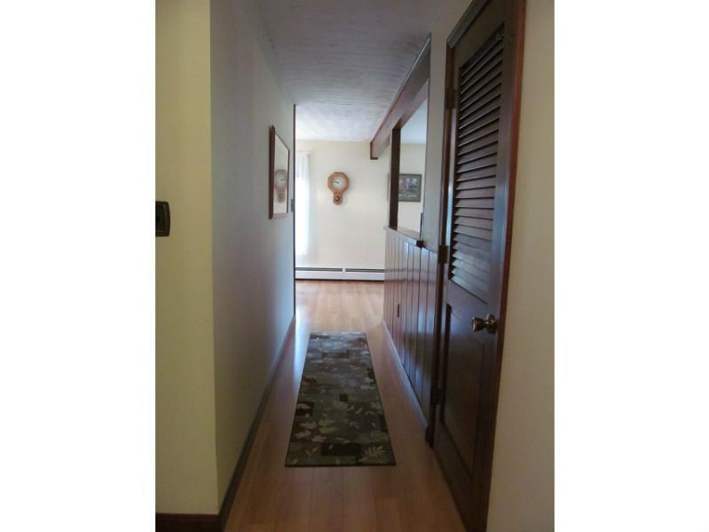 123 Dillingham Road North Berwick, ME 03906 - Photo 19 of 35 Hallway. Hall way leading into the...