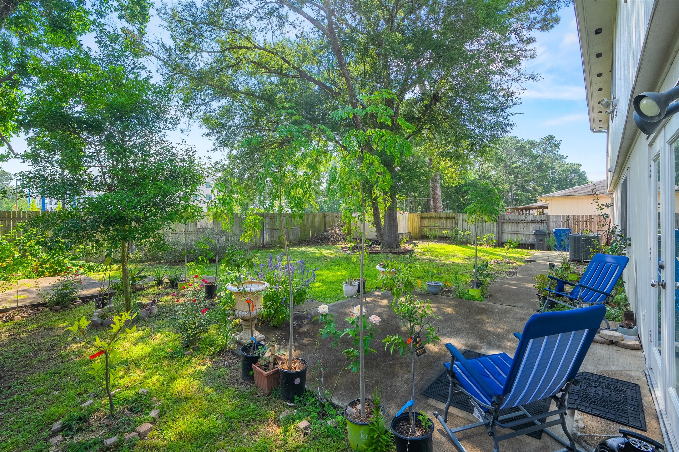 28723 Sedgefield Street Spring, TX 77386 - Photo 19 of 20 a view of backyard with outdoor seating and green space