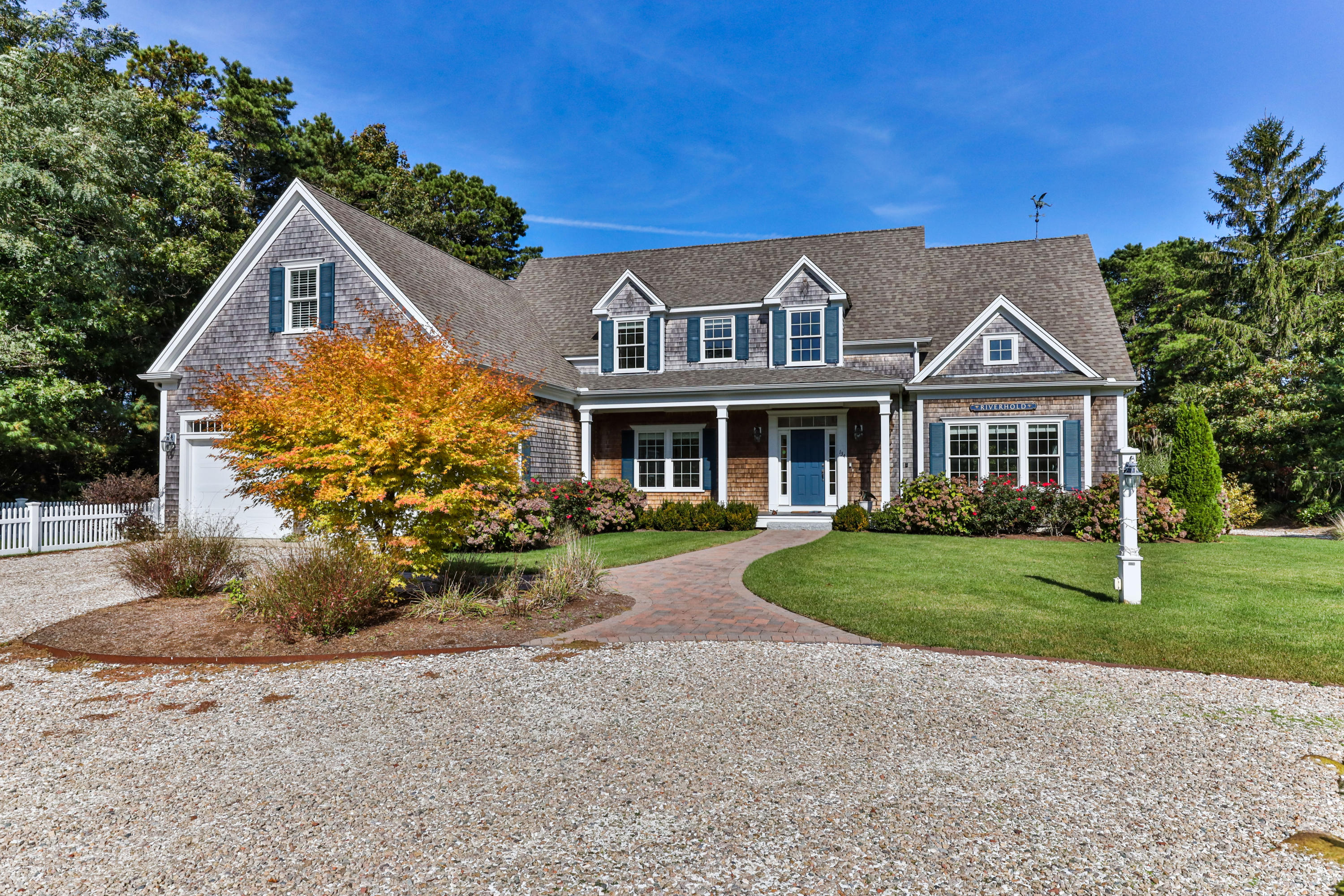 134 Namequoit Road Orleans, MA 02653 - Photo 3 of 69 a front view of a house with garden