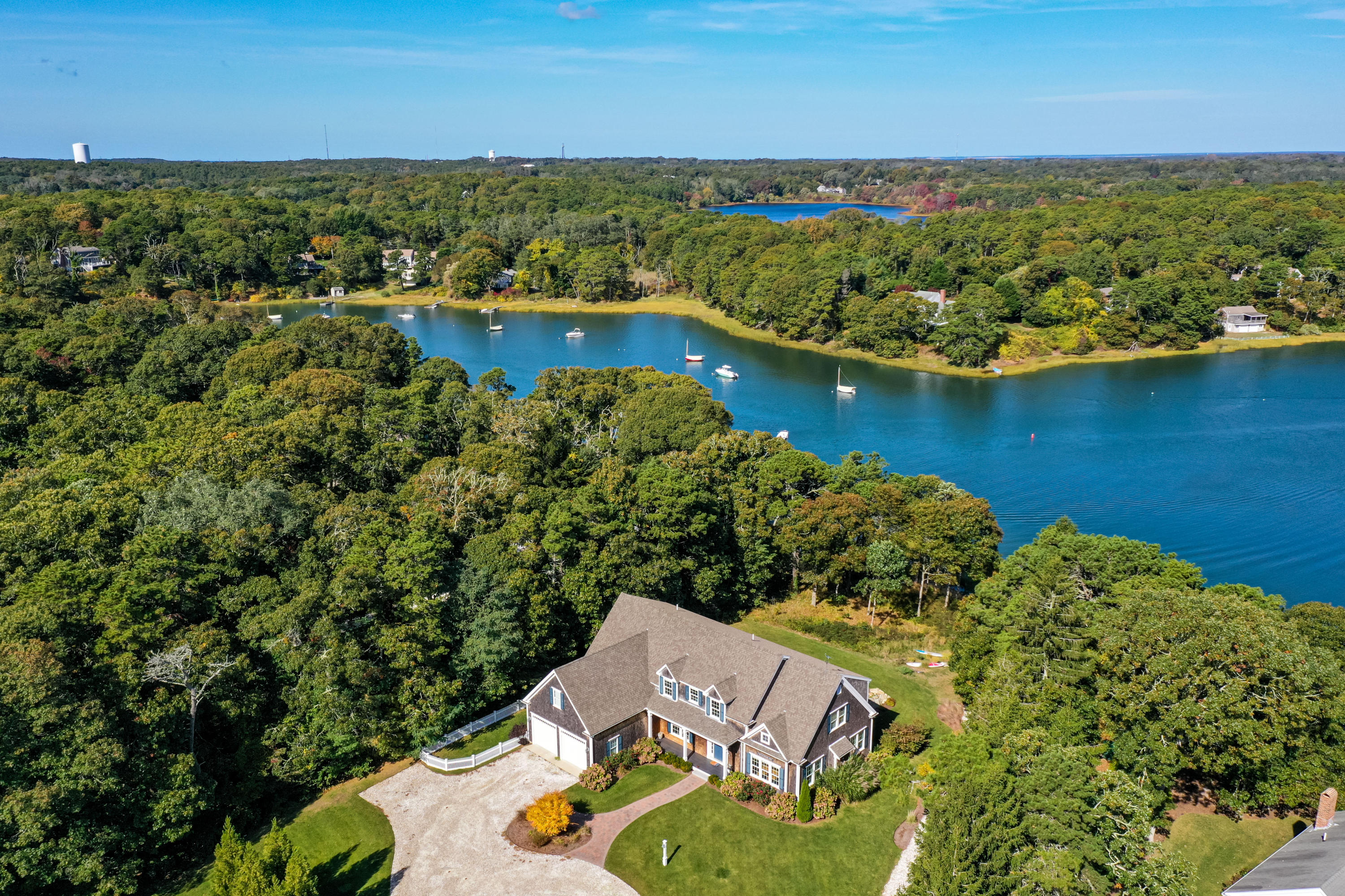 134 Namequoit Road Orleans, MA 02653 - Photo 54 of 69 an aerial view of a house with a lake view