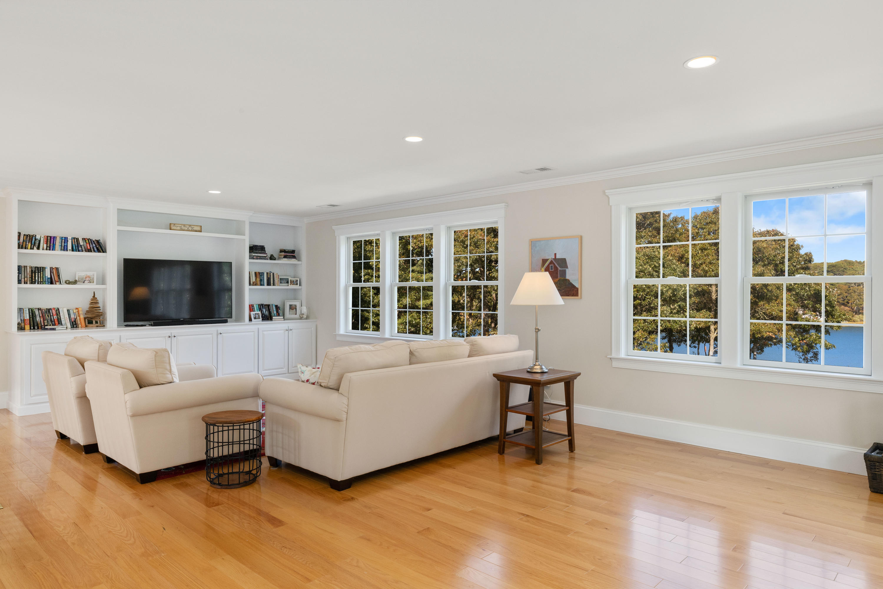 134 Namequoit Road Orleans, MA 02653 - Photo 8 of 69 a living room with furniture and a flat screen tv