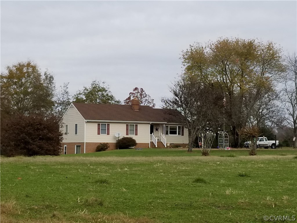 14500 Reed Rock Road Amelia Court House, VA 23002 - Photo 2 of 37 a front view of a house with a garden