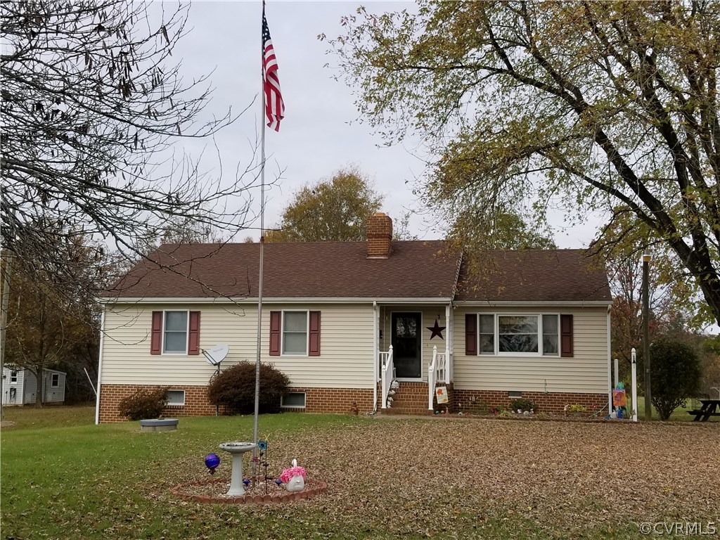 14500 Reed Rock Road Amelia Court House, VA 23002 - Photo 6 of 37 a front view of a house with a yard and tree s