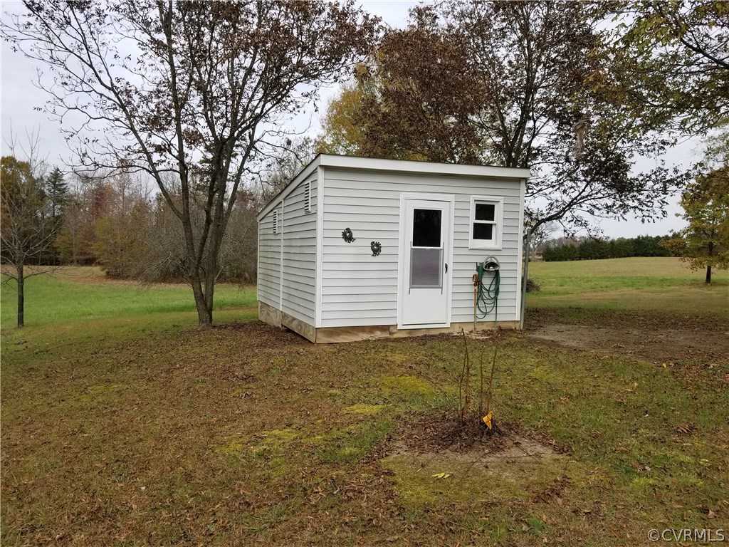 14500 Reed Rock Road Amelia Court House, VA 23002 - Photo 8 of 37 a view of a house with a yard
