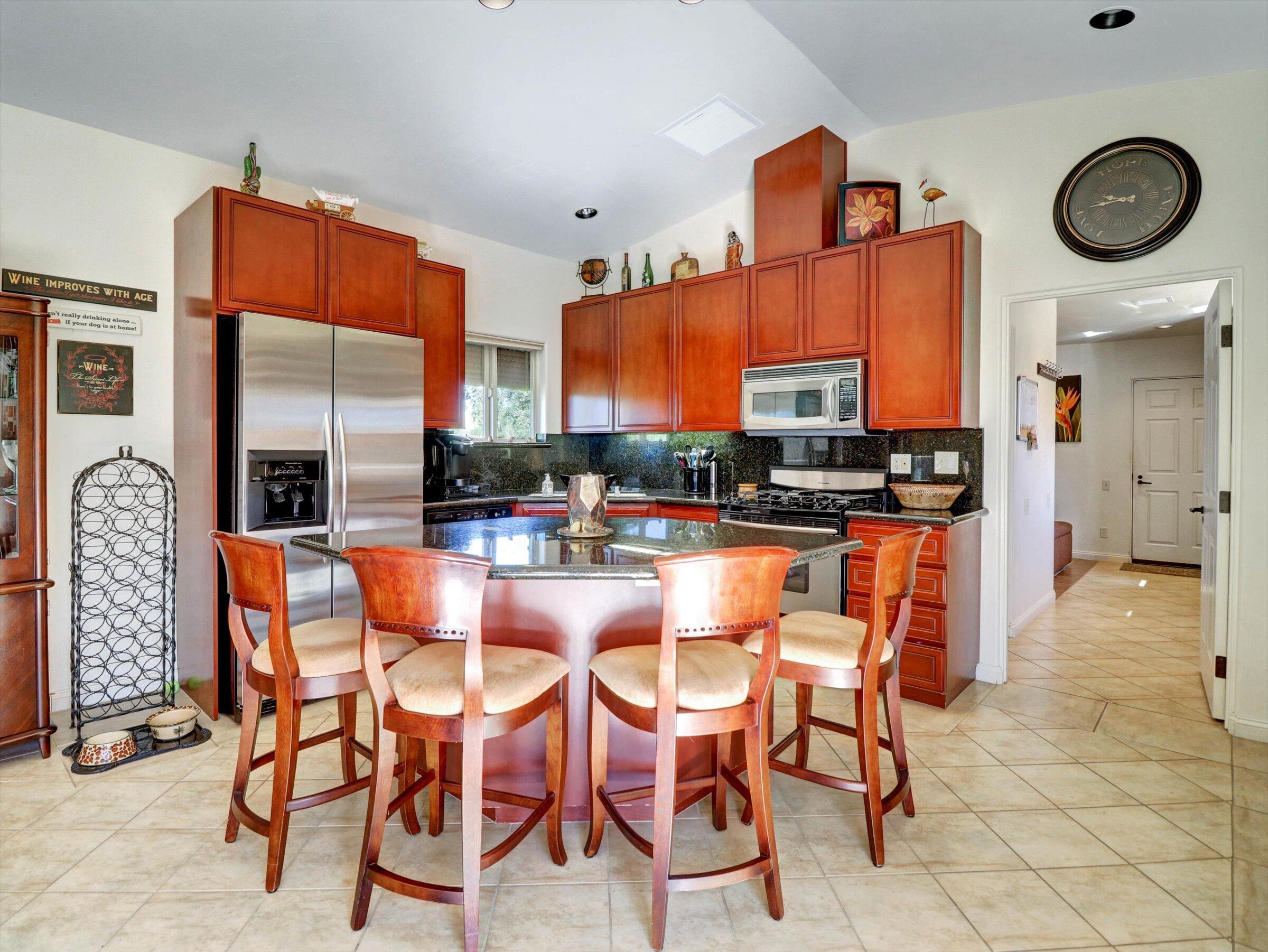 86113 Sonoma Creek Road Coachella, CA 92236 - Photo 11 of 55 a dining room with furniture and a large window