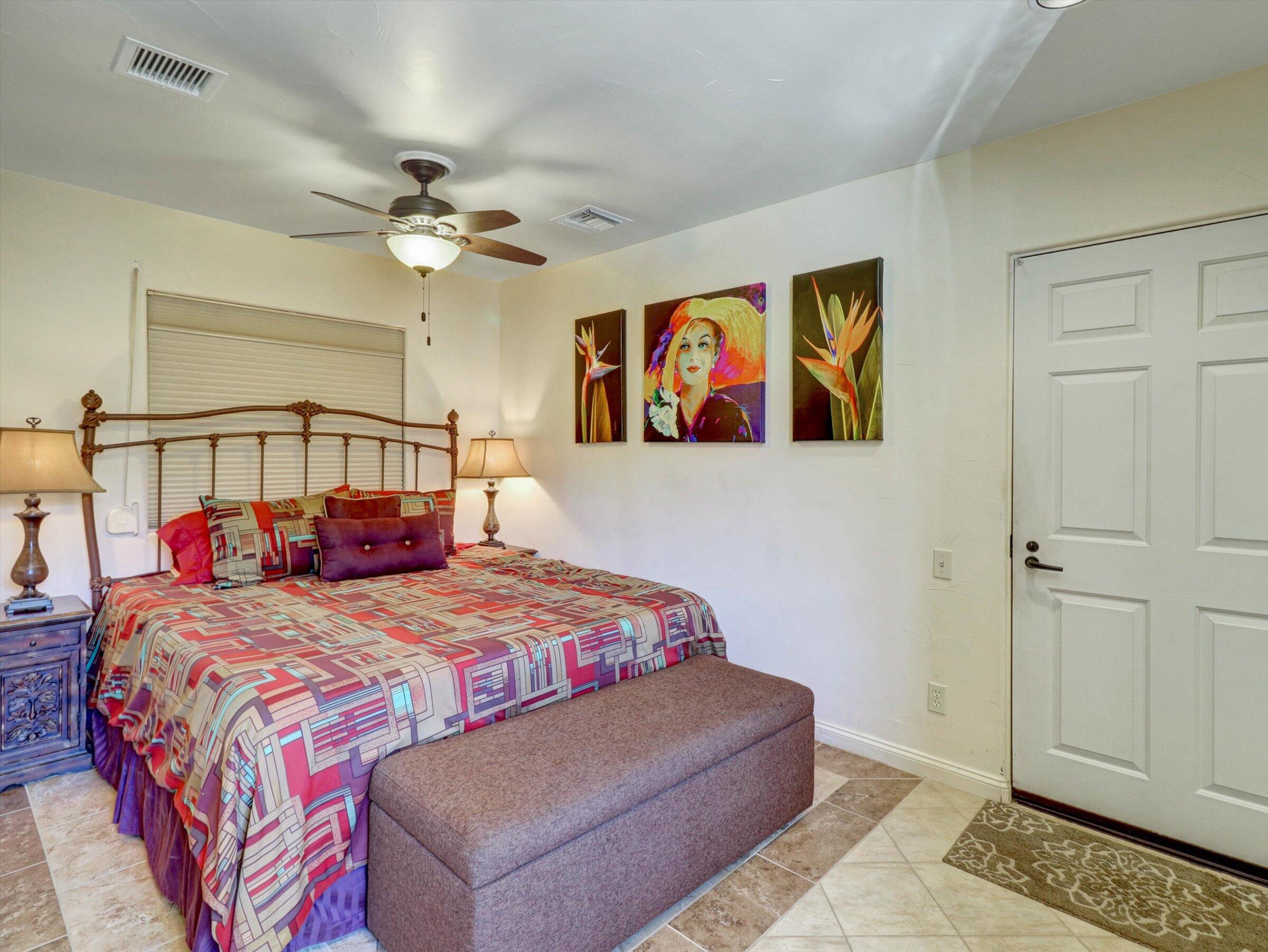 86113 Sonoma Creek Road Coachella, CA 92236 - Photo 21 of 55 a bedroom with a bed and cabinets