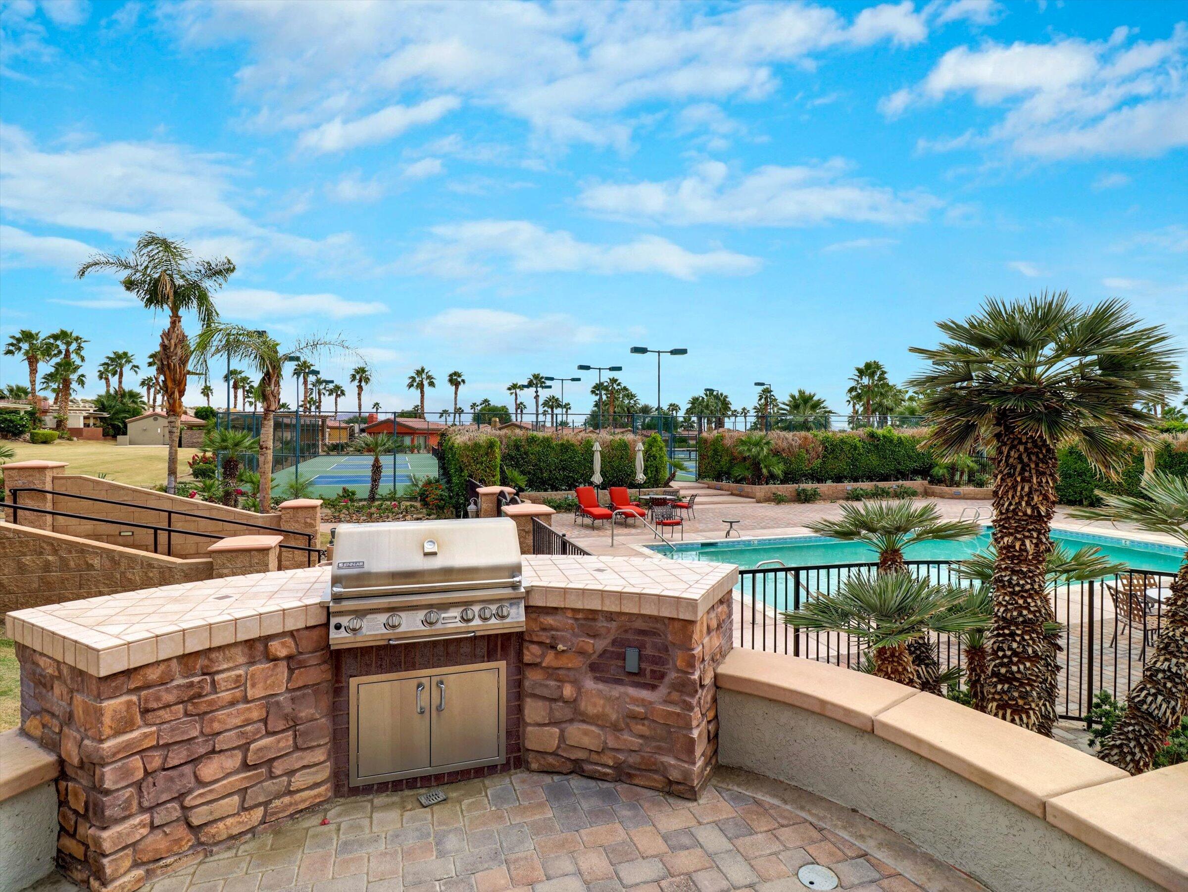 86113 Sonoma Creek Road Coachella, CA 92236 - Photo 42 of 55 a view of a patio with a yard