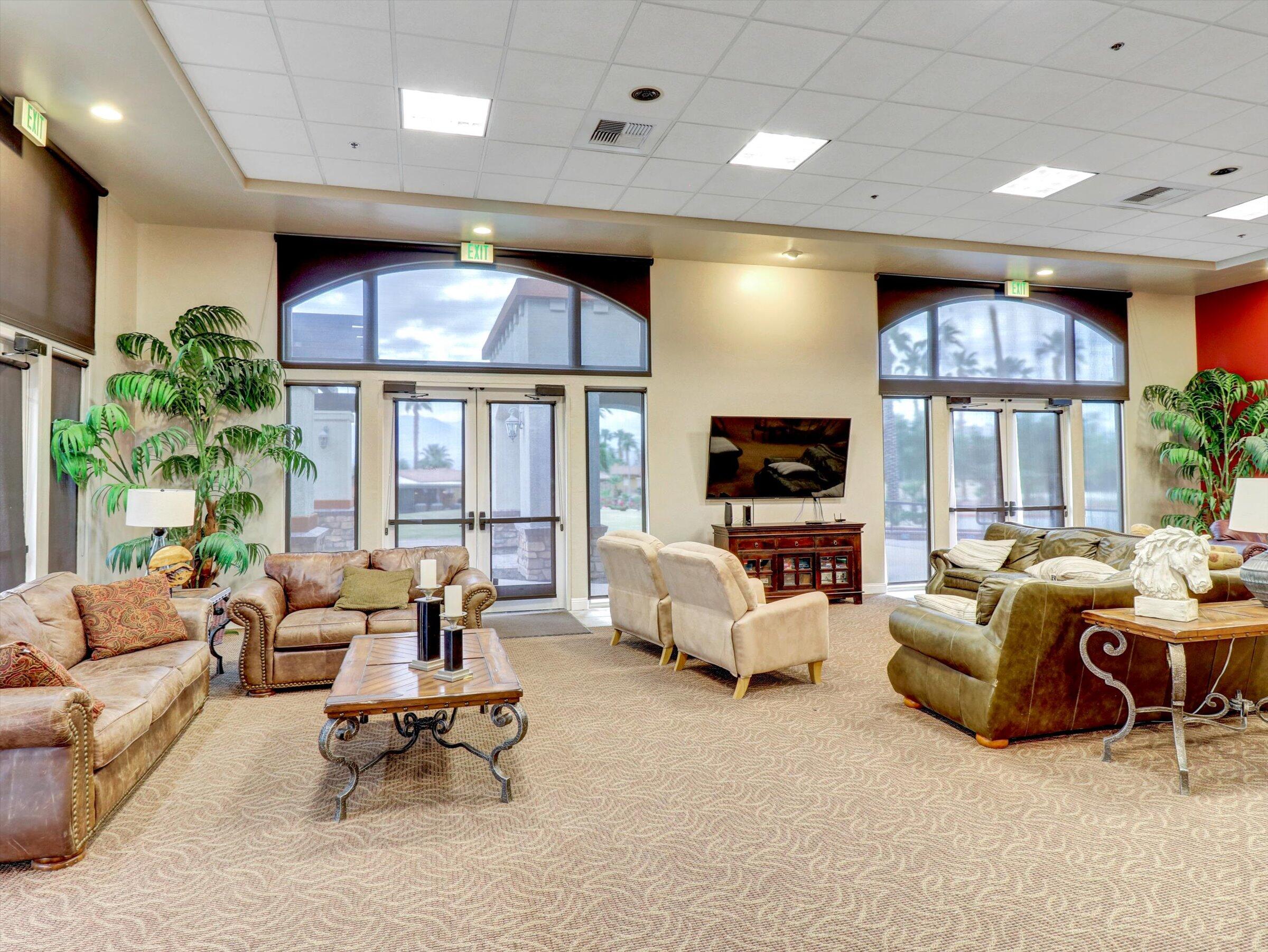 86113 Sonoma Creek Road Coachella, CA 92236 - Photo 46 of 55 a living room with furniture flat screen tv and a large window