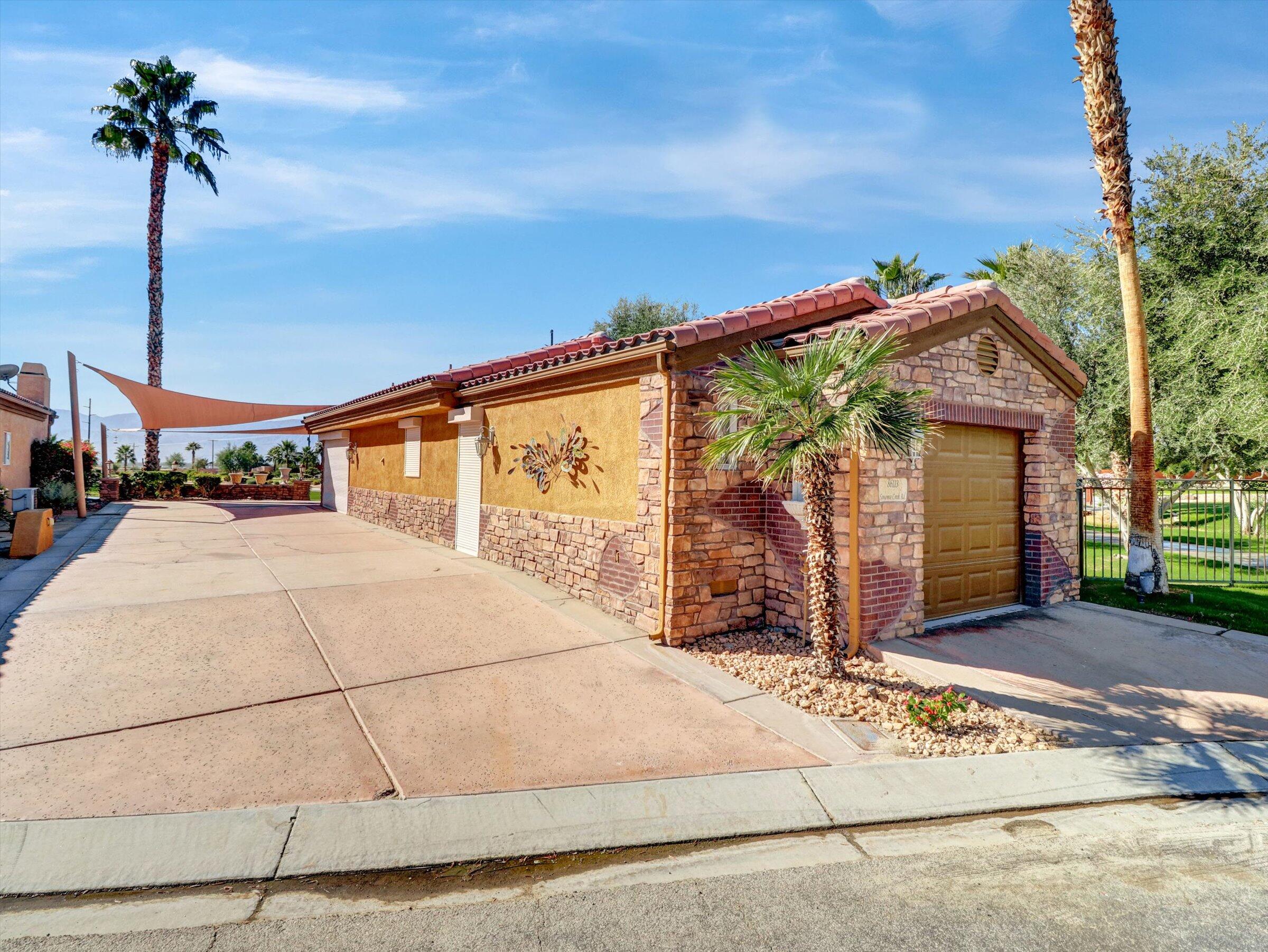 86113 Sonoma Creek Road Coachella, CA 92236 - Photo 5 of 55 a view of a house with a patio