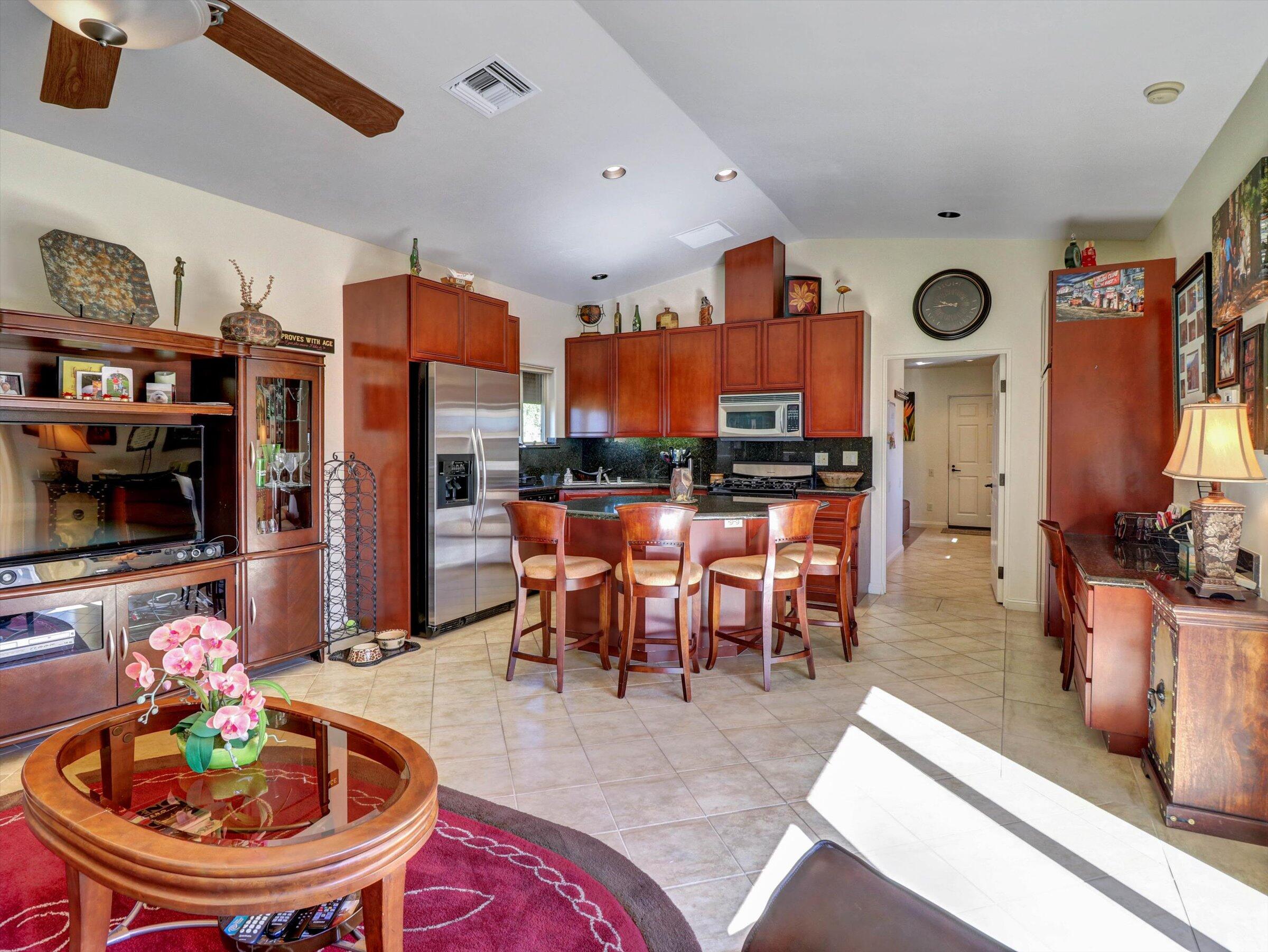 86113 Sonoma Creek Road Coachella, CA 92236 - Photo 10 of 55 a living room with furniture and a dining table