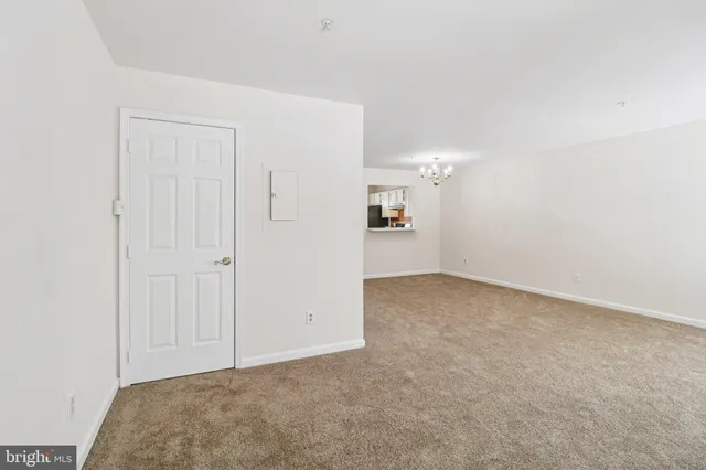 a kitchen with a stove sink and refrigerator