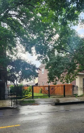 a view of street next to a yard