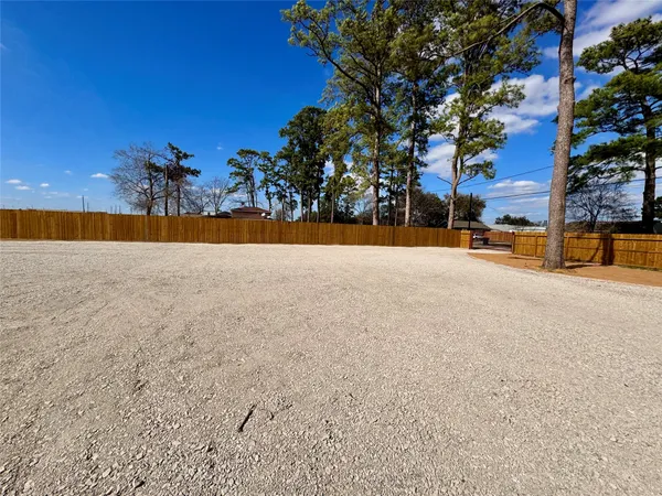 a view of a swimming pool and an outdoor space