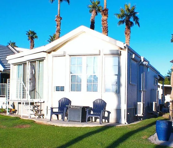a bathroom with a sink a mirror and a shower