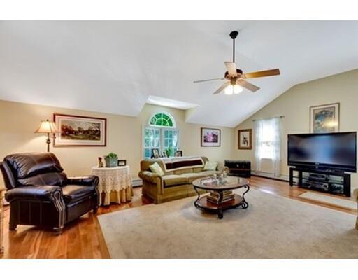 6 Stone Ridge Drive Leicester, MA 01524 - Photo 12 of 30 a living room with furniture and a flat screen tv