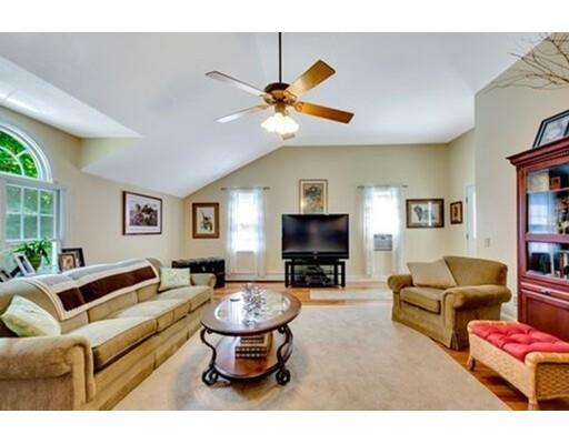 6 Stone Ridge Drive Leicester, MA 01524 - Photo 13 of 30 a living room with furniture a flat screen tv and a window