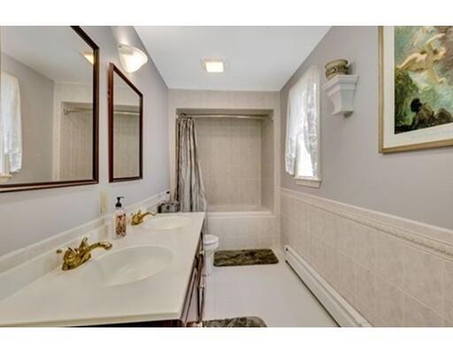 6 Stone Ridge Drive Leicester, MA 01524 - Photo 17 of 30 a bathroom with a sink mirror and a bathtub