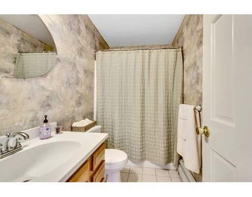 6 Stone Ridge Drive Leicester, MA 01524 - Photo 21 of 30 a bathroom with a sink and a mirror