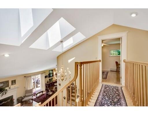 6 Stone Ridge Drive Leicester, MA 01524 - Photo 23 of 30 a view of a hallway with wooden floor and stairs