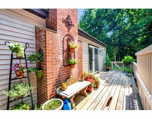 6 Stone Ridge Drive Leicester, MA 01524 - Photo 24 of 30 a view of a backyard with sitting area