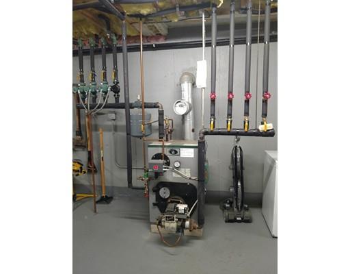 6 Stone Ridge Drive Leicester, MA 01524 - Photo 28 of 30 a room with gym equipment