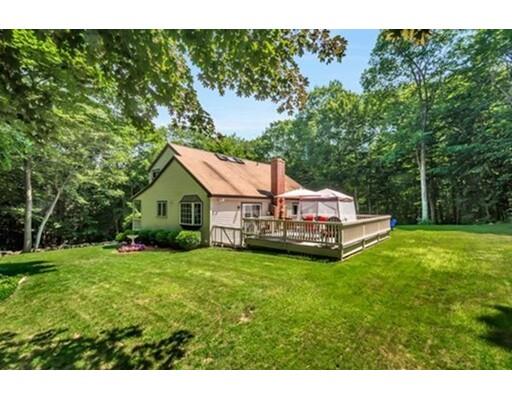 6 Stone Ridge Drive Leicester, MA 01524 - Photo 3 of 30 a aerial view of a house with a big yard potted plants and large tree
