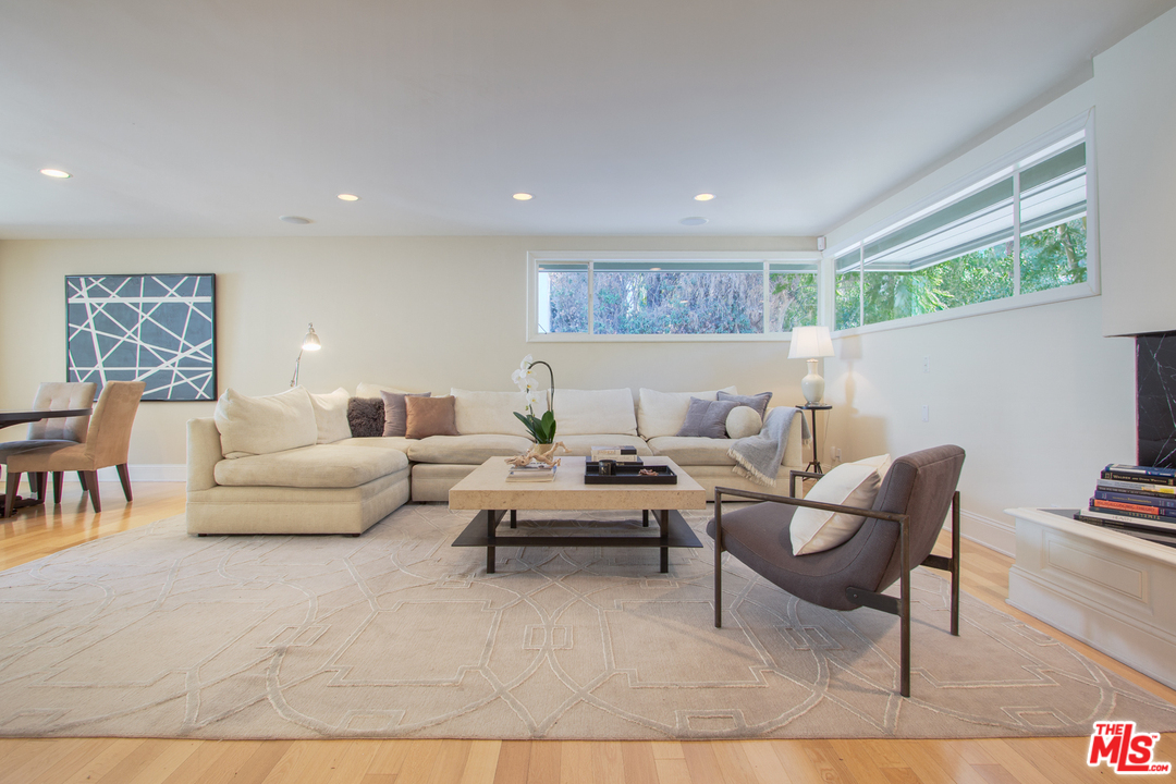 2267 Roscomare Road Los Angeles, CA 90077 - Photo 1 of 31 a living room with furniture and a large window
