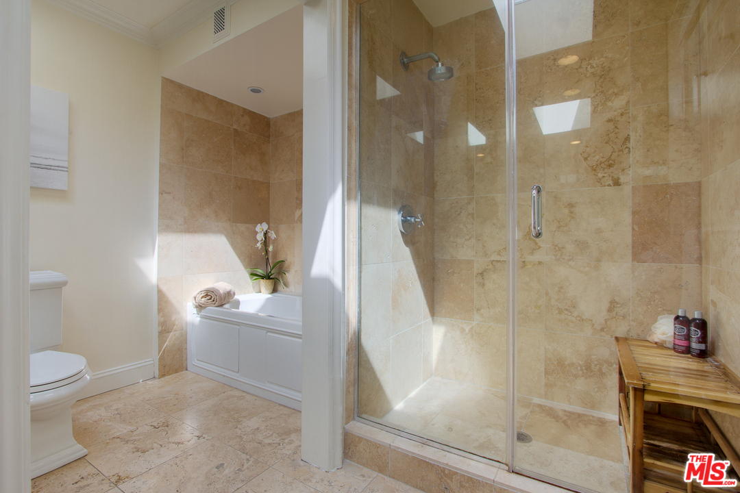 2267 Roscomare Road Los Angeles, CA 90077 - Photo 11 of 31 a bathroom with a bathtub and a sink