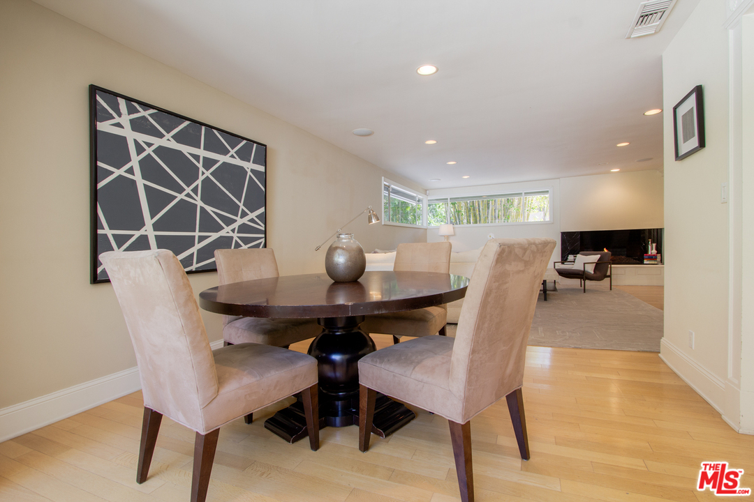 2267 Roscomare Road Los Angeles, CA 90077 - Photo 3 of 31 a view of a dining room and livingroom