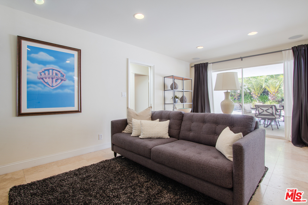 2267 Roscomare Road Los Angeles, CA 90077 - Photo 7 of 31 a living room with furniture and a large window