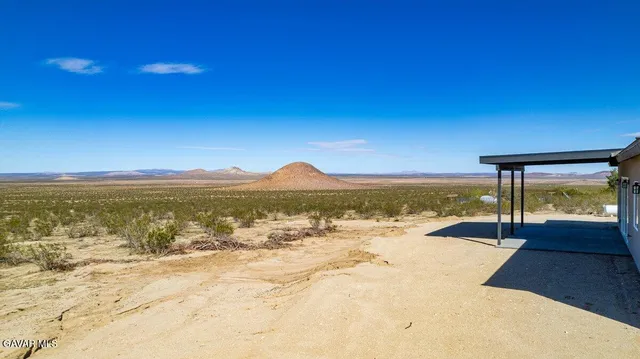 a view of a terrace with a ocean view