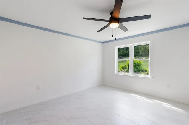 a bathroom with a sink mirror toilet and shower