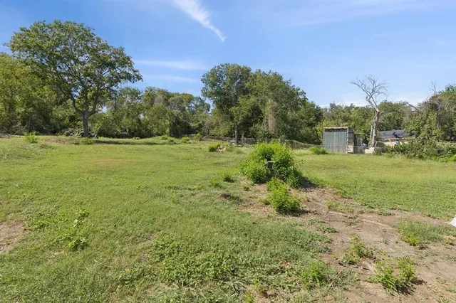 a house view with a garden space