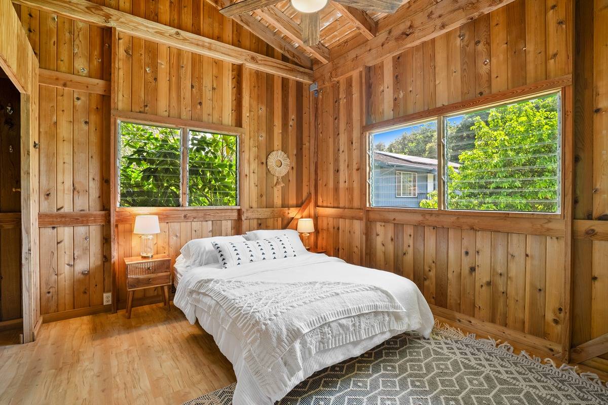 4875 A Hauaala Road, Unit 2 Kapaa, HI 96746 - Photo 9 of 30 a bedroom with a bed and a window