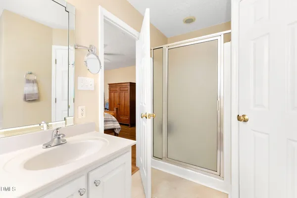 a bathroom with a toilet and a bathtub