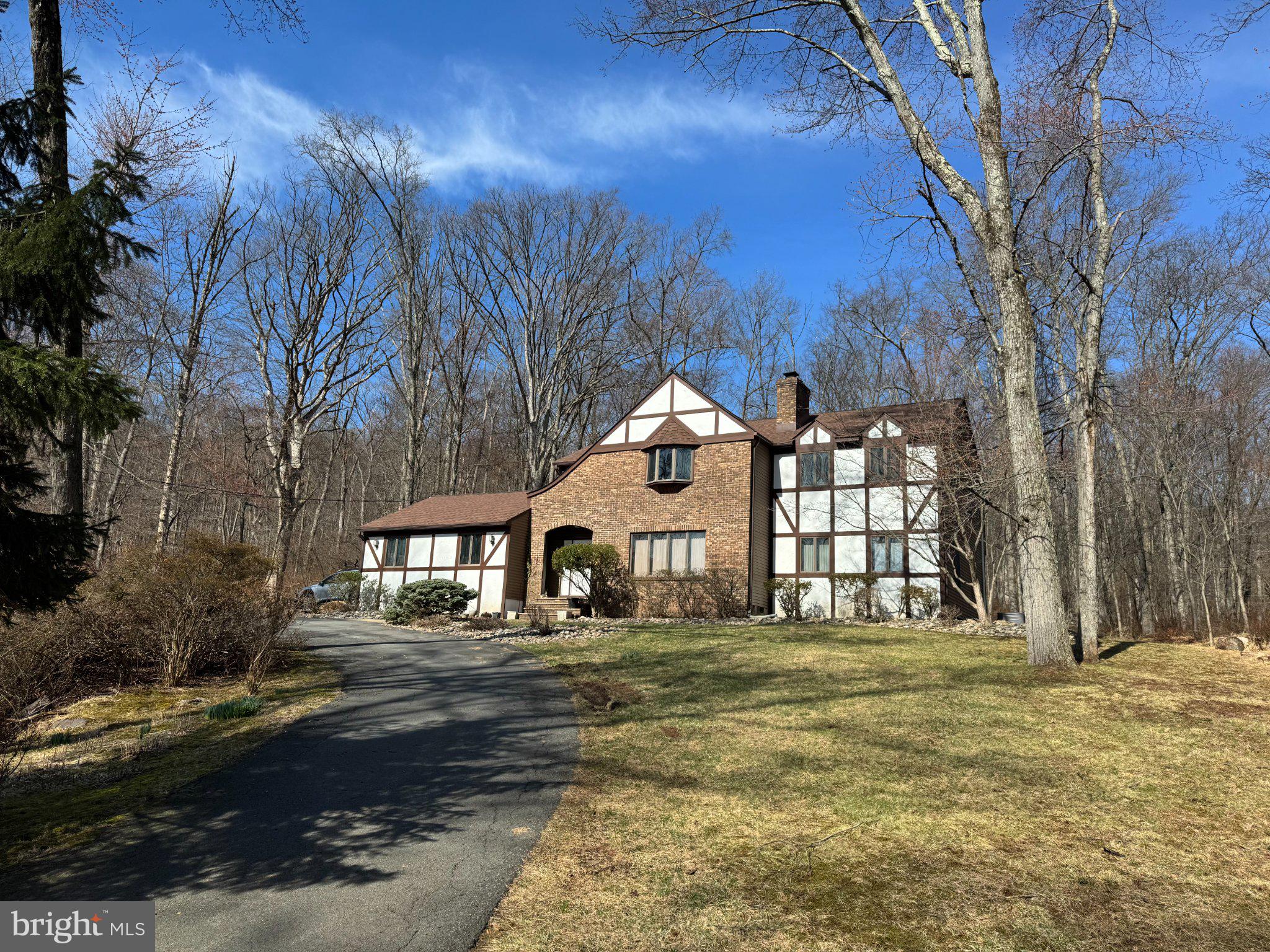 169 East Mountain Road Hillsborough, NJ 08844 - Photo 1 of 29 Charming home nestled in serene woods.