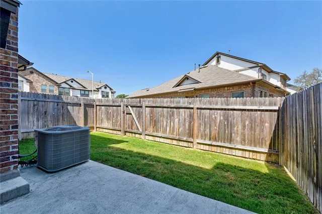 a view of sign board and yard