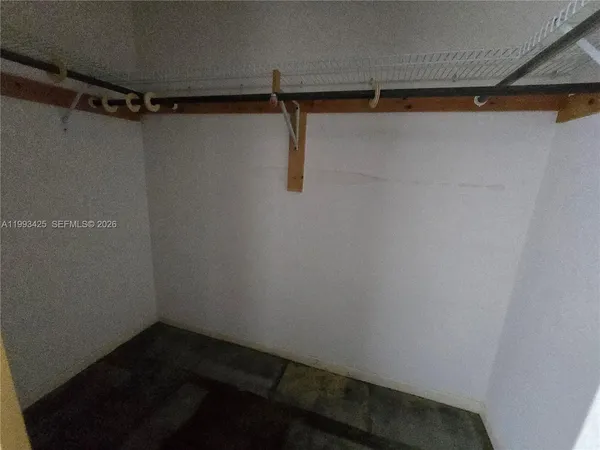 a view of a room with racks on the wall