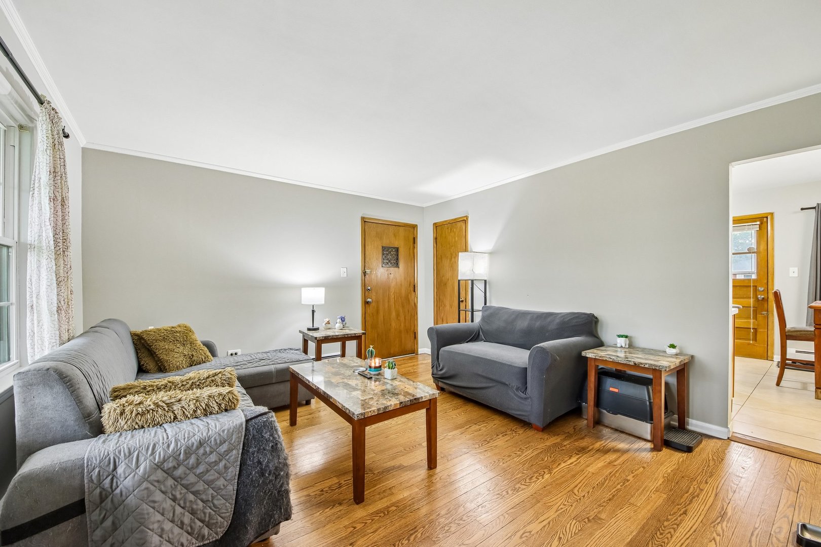 1855 Parkside Drive, Unit 8 Park Ridge, IL 60068 - Photo 8 of 22 a living room with furniture and a wooden floor