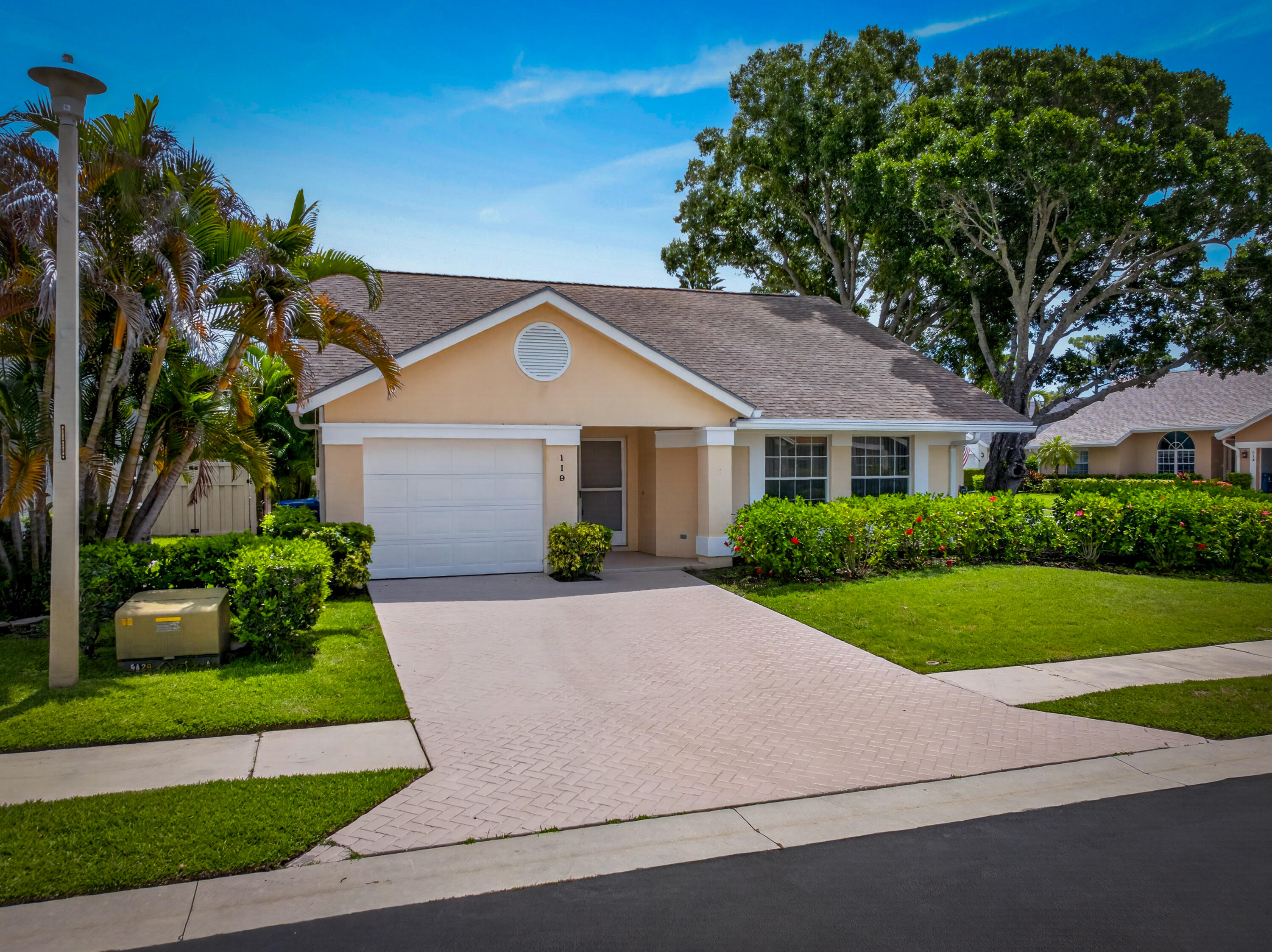 119 Adobe Circle Jupiter, FL 33458 - Photo 2 of 43 DJI_20260703120520_0927_D