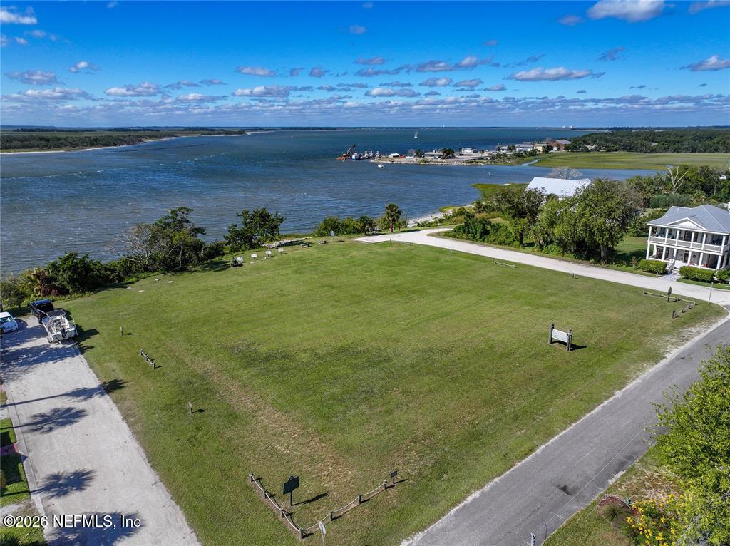 903 Someruelus Street Fernandina Beach, FL 32034 - Photo 24 of 31 a view of a lake from a yard