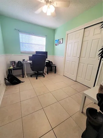 a room with furniture and a window