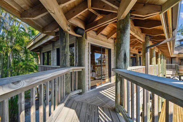 a view of living room with furniture and a fireplace
