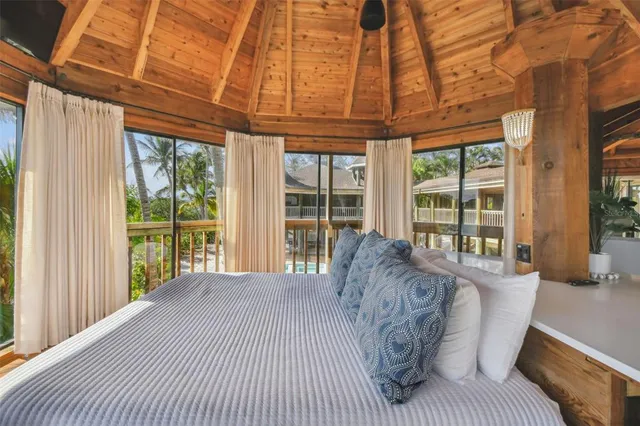 a view of a hallway view with wooden floor and furniture