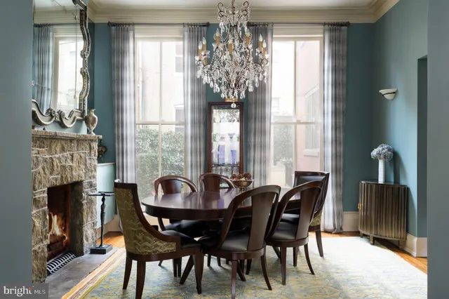 a view of a dining room with furniture and window