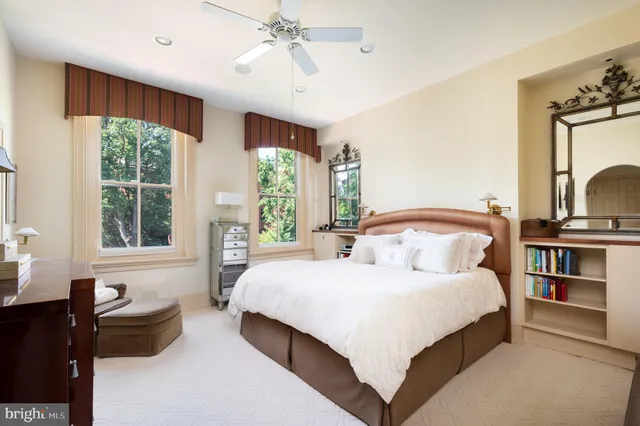 a view of a hallway with washer and dryer