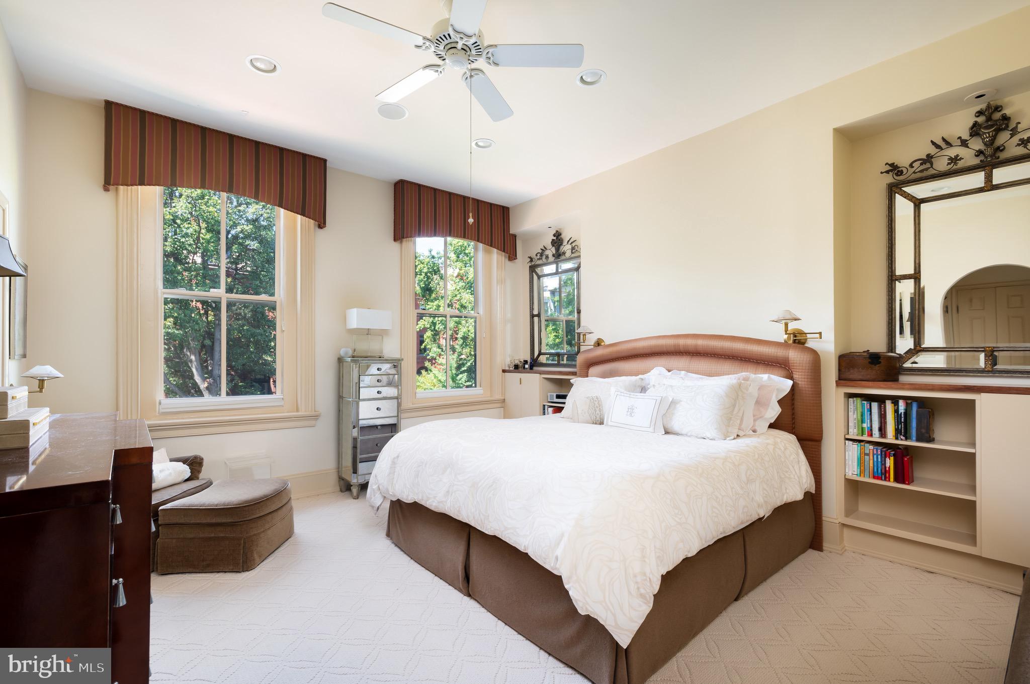 1335 Vermont Avenue Northwest Washington, DC 20005 - Photo 25 of 47 a bedroom with a large bed and a window