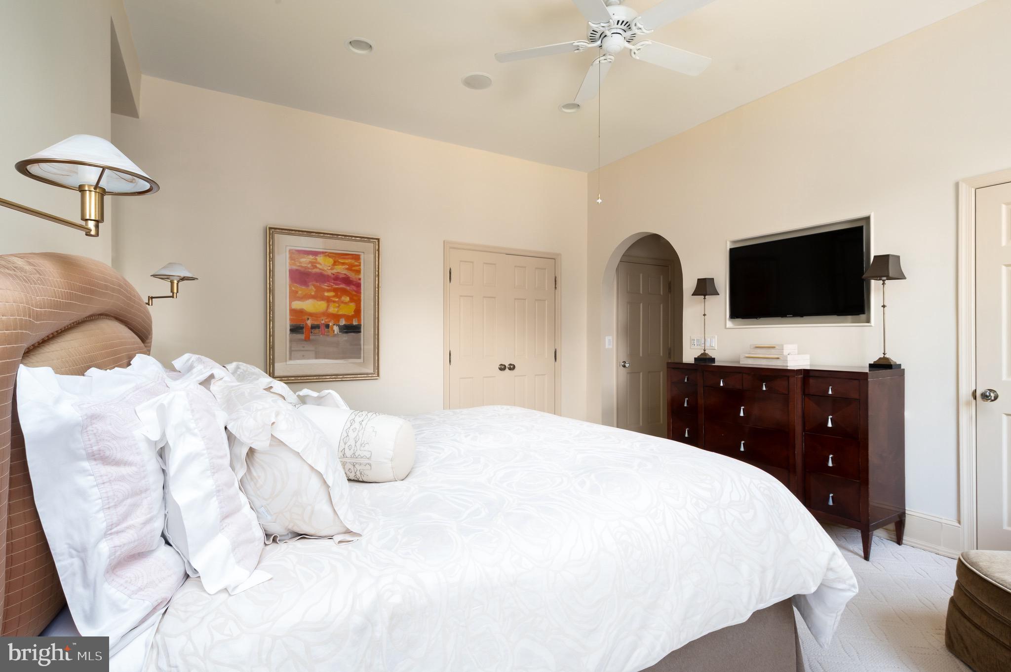 1335 Vermont Avenue Northwest Washington, DC 20005 - Photo 26 of 47 a bedroom with a bed and a flat screen tv